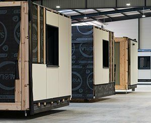 Présentation de TH, entreprise qui conçoit et construit des habitats modulaires bas carbone en structure bois